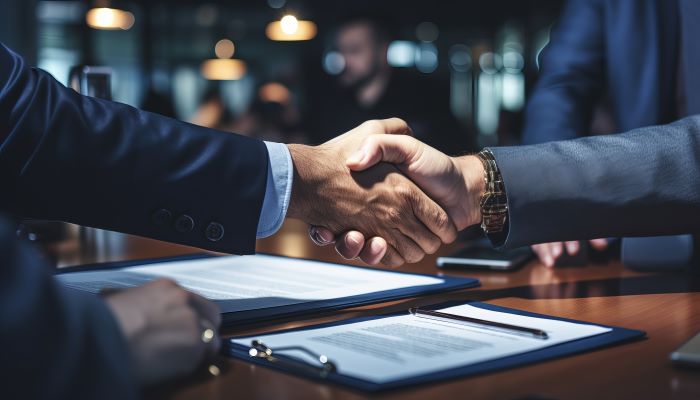 Business people shaking hands